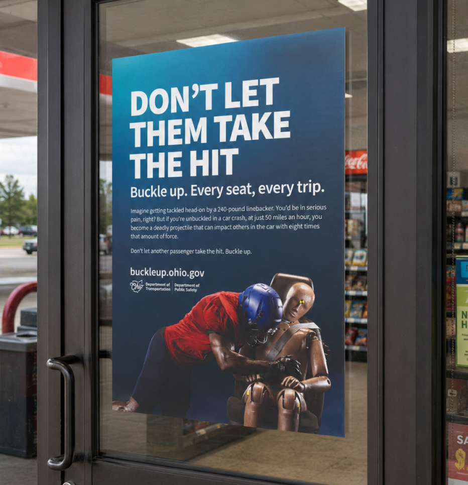 Ohio seat belt campaign poster on a public entrance.