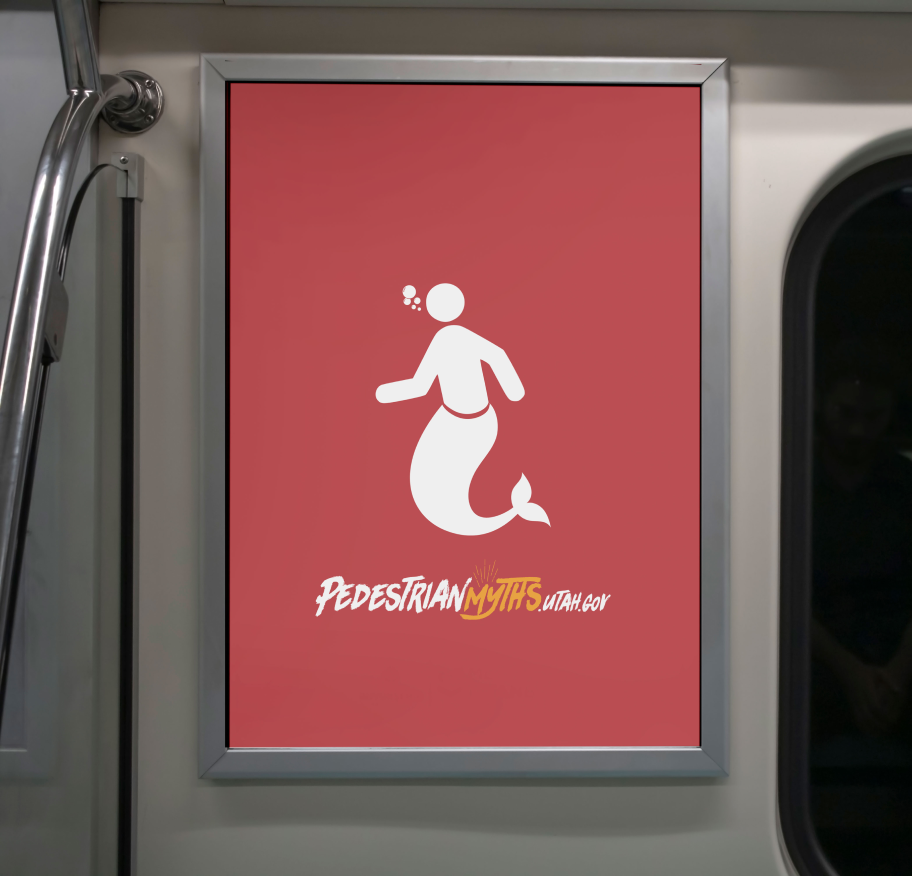 Red Pedestrian Myths mermaid advertisement inside a transit vehicle