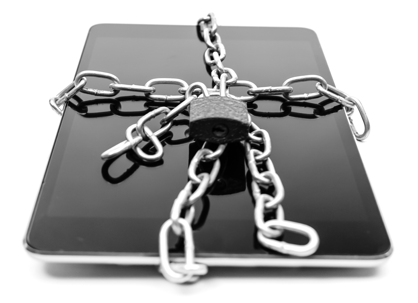A smartphone bound in chains and secured with a padlock